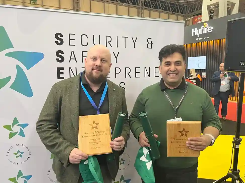 Arez.io founder and co-founder receiving a security industry award